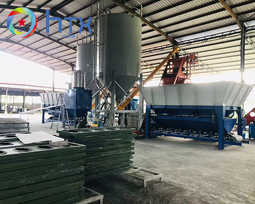 Linea di produzione automatica di pannelli murali per applicazioni interne ed esterne